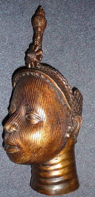 Lot 265 - A Benin, Nigeria Bronze Oba's Head, wearing a diadem with baluster and rosette finial, the face...