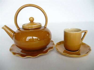 Lot 1149 - A Linthorpe Pottery Teapot and Cover, shape No.628, mustard glaze, impressed factory mark and...