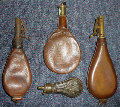 Lot 297 - A Leather Shot Flask, with brass plug measure; two other Leather Shot Flasks, with brass sprung...