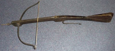 Lot 353 - An 18th Century "Fenland" Hunting Crossbow, the steel bow with 56cm span, the elm stock with...