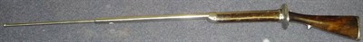 Lot 361 - A Bayonet Practise Rifle, with 120cm sprung steel "barrel", polished steel cup guard, two piece...