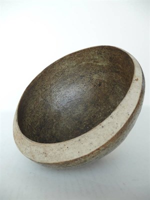 Lot 1160 - Victor Priem (Riga Latvia) A Stoneware "Planet" Bowl, brown and oatmeal glaze, on two feet so...