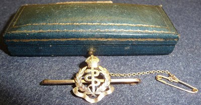 Lot 44 - A 9 Carat Gold Sweetheart Brooch to the Royal Army Medical Corps, with safety chain and pin,...