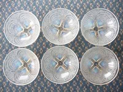 Lot 1165 - A Set of Six Lalique Opalescent Glass Circular Bowls "Coquille", each moulded in relief with...