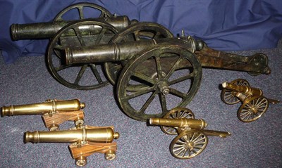 Lot 76 - A Pair of Brass Models of Signal Cannons, with verdigris patina, each with 34cm barrel, on a triple