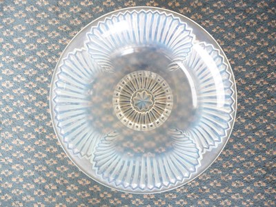 Lot 1166 - A Rene Lalique "Montigny" Coupe, circa 1928, in clear and frosted glass, moulded R Lalique...