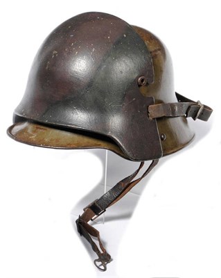 Lot 88 - A First World War German 1915 Pattern Helmet with Rare Sniper Fire Protection Attachment, the...