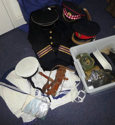 Lot 97 - A Small Collection of Military Uniforms, comprising an RAF blouse and trousers, a Merchant Navy...