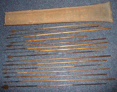 Lot 169 - A Collection of Fifteen Indonesian Arrows, with iron heads and bamboo hafts, some with leather...