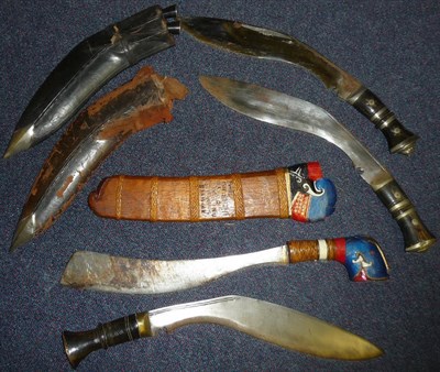 Lot 179 - A Malayan Parang, with swollen and curved single edge steel blade, the red, white and blue...