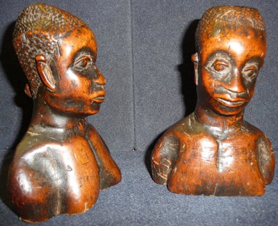 Lot 192 - A Pair of Late 19th/20th Century Hardwood Busts, of a West African man and a woman with plaited and