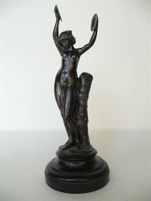 Lot 1178 - Marin: A Bronze Figure of a Nude Maiden with Cymbals, circa 1890, standing beside a tree stump,...