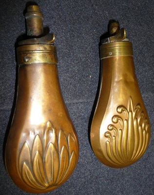 Lot 210 - Two Copper Pistol Flasks, each of flattened pear shape, embossed with palm leaves, with brass...