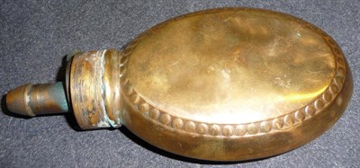 Lot 215 - An Unusual Copper Lozenge Shape Powder Flask, with beaded borders, brass charger and steel spring.