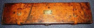 Lot 219 - A 19th Century Stitiched Leather Shotgun Case, the hinged cover set with a brass plaque...