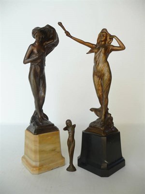 Lot 1182 - An Art Nouveau Patinated Spelter Figure of Liberty, modelled as a semi-clad female with...