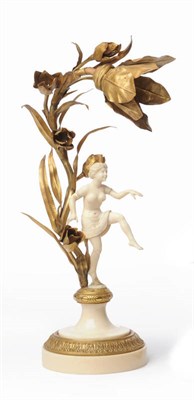 Lot 1184 - An Art Nouveau Gilt Metal and Ivory Figural Table Lamp, the gilt metal foliage mounted with a...