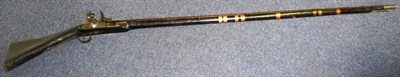 Lot 281 - A 19th Century Indian Flintlock Trade Musket, the 123cm steel barrel with fluted slightly...