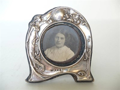 Lot 1191 - An Art Nouveau Silver Mounted Photograph Frame, Birmingham 1908, cast with a maiden and a...