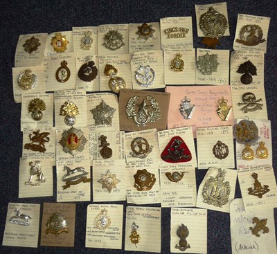 Lot 69 - A Collection of Eighty Four Military Cap Badges, mainly brass and white metal, with some staybrite