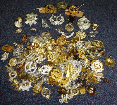 Lot 70 - A Collection of One Hundred and Thirty Military Cap Badges, mainly staybrite, with some white...