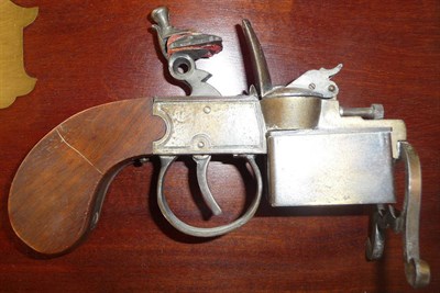 Lot 77 - A Ronson's "Tinder Pistol" Table Cigarette Lighter, with walnut slab butt.