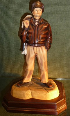 Lot 96 - An Ashmor Porcelain Figure of a United States 8th Army Air Force Pilot 1942-45, limited edition...