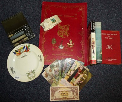 Lot 116 - Militaria, including a Chelson China commemorative plate `Victory 1914-1919', a Sussex China...