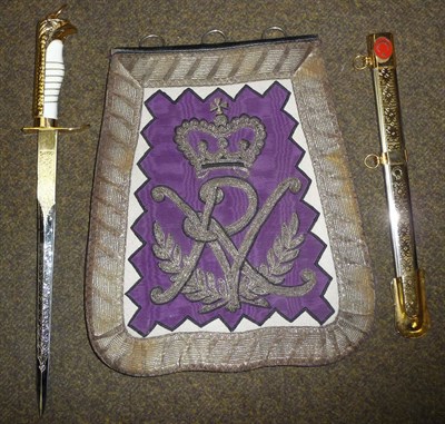 Lot 120 - A Modern Black Leather Sabretache, the purple moire taffeta fascia embroidered with crowned VR...