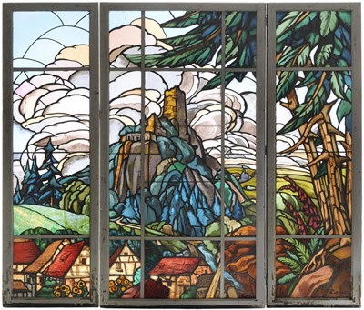 Lot 1198 - Jacques Gruber (French 1870-1936): A Three-Panel Leaded Glass Window, depicting a landscape...