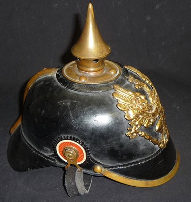 Lot 129 - A Post 1895 Prussian Infantry Line Helmet, the black leather skull with stamped gilt brass...