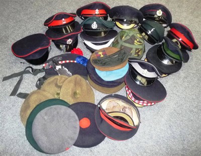 Lot 130 - A Collection of Modern Military Head Gear, comprising fifteen peaked caps, two glengarries, an Army