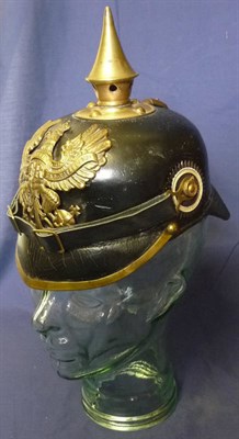 Lot 134 - A Post 1895 Prussian Infantry Line Helmet, the black leather skull with stamped gilt brass...