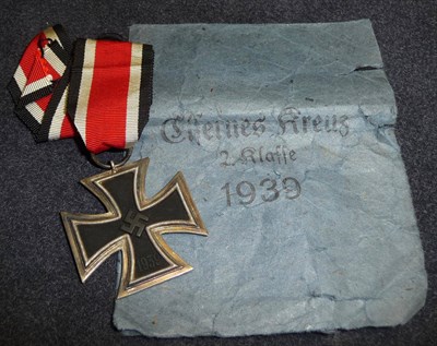 Lot 151 - A German Third Reich Iron Cross, Second Class, the suspender ring stamped 25, together with...