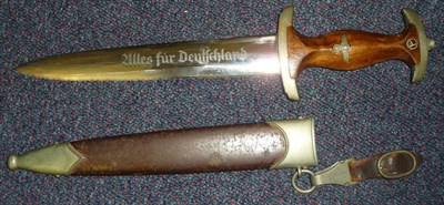 Lot 164 - A German Third Reich SA Dagger, the double edge steel blade etched `Alles fur Deutschland'' and...