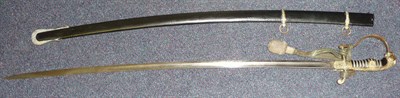 Lot 169 - A German Third Reich Cavalry Officer's Sword, the 79cm single edge fullered steel blade by Carl...