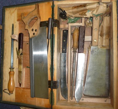 Lot 186 - A Second World War Military Issue Butcher's Kit, the green painted wood and steel fitted case...