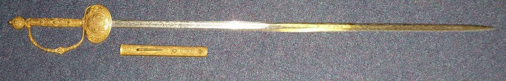 Lot 188 - An Early 20th Century German Society Sword, the 81cm narrow single edge fullered steel blade etched
