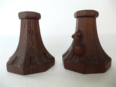 Lot 1206 - A Pair of Robert "Mouseman" Thompson Oak Squat Candlesticks, dated 1936, of octagonal form with...