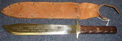 Lot 201 - A Modern Bowie Knife, the hatchet tip steel blade etched `Remember the Alamo 1836. The Last...