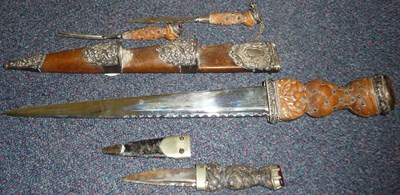 Lot 202 - A Late Victorian Scottish Dirk, the 30cm single edge steel blade with narrow fuller and...