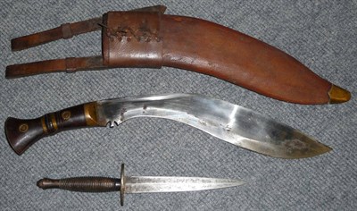 Lot 236 - A Commando Fighting Knife, Third Pattern, with machine forged blade, black painted brass...