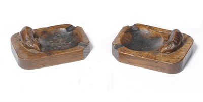 Lot 1210 - A Pair of Robert "Mouseman" Thompson Oak Ashtrays, each with carved mouse signature, 10cm (good...