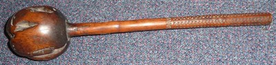 Lot 281 - A 19th Century Fijian Ula (Throwing Club), with globular ball head, the haft grip carved with...