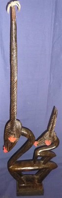 Lot 301 - A Bambara, Mali, Chi-Wara Fertility Headdress, of carved wood in the form of a female antelope,...