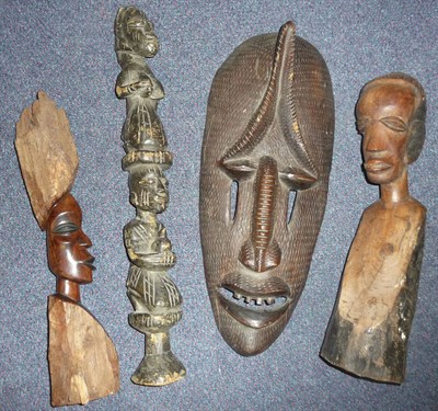 Lot 307 - A Cameroon Wood Mask, with oblong face, high arched eyebrows, slit eyes, open mouth with upper...