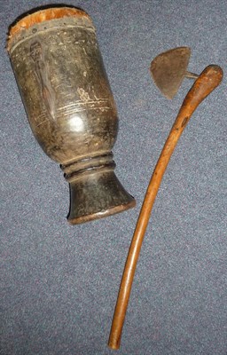 Lot 317 - A West African Small Dark Wood Djembe (Hand Drum), of rounded cylindrical form, the animal hide...