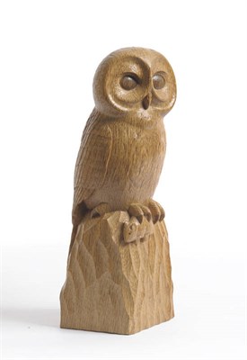 Lot 1218 - A Robert "Mouseman" Thompson Carved Oak Owl, carved as a standing owl holding a mouse in its...