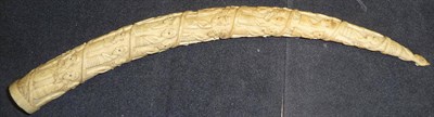 Lot 321 - A Late 19th Century Loango, West Africa Carved Ivory Elephant Tusk, spirally carved with slaves...