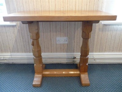 Lot 1220 - A Robert "Mouseman" Thompson Oak Extension Table, on two octagonal legs joined by a single...